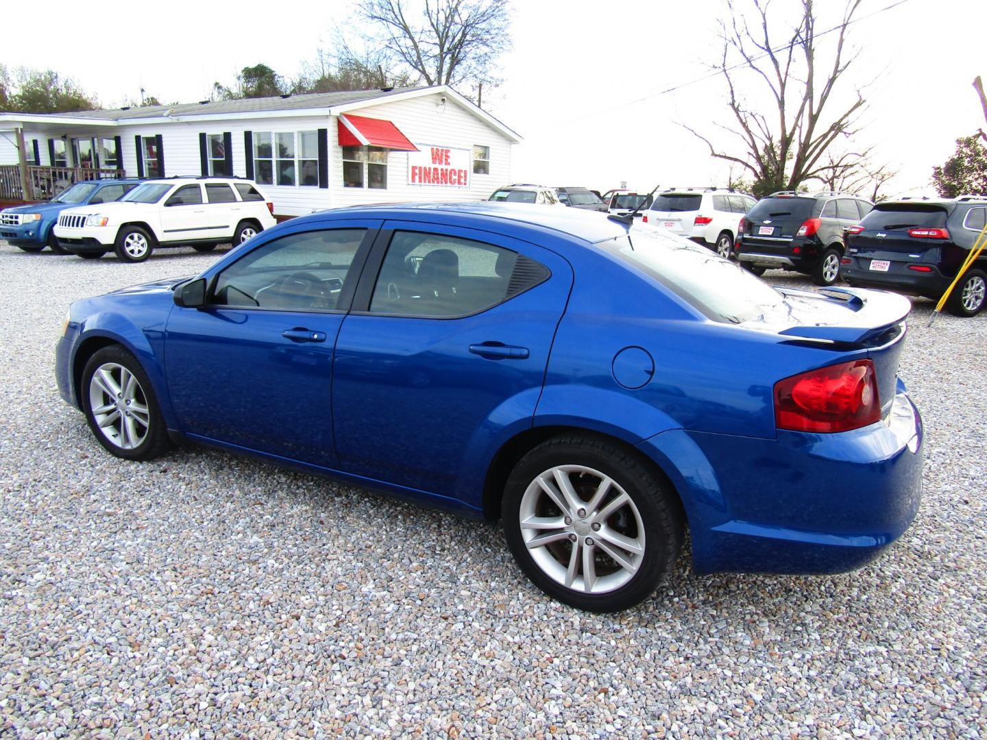 2012 Blue Dodge Avenger SE (1C3CDZAG6CN) with an 3.6L V6 DOHC 24V FFV engine, Automatic transmission, located at 15016 S Hwy 231, Midland City, AL, 36350, (334) 983-3001, 31.306210, -85.495277 - Photo#5